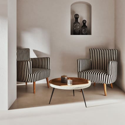 Tavolino da salotto rotondo in legno massello di mango scolpito e