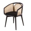 Fauteuil de table noir et cannage en rotin