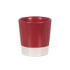 Tasse aus rotem und weißem Steingut