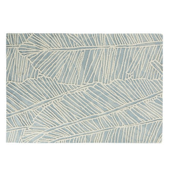 MANDRIER - Getuft tapijt met blauwe en ecru plantenprint 140x200