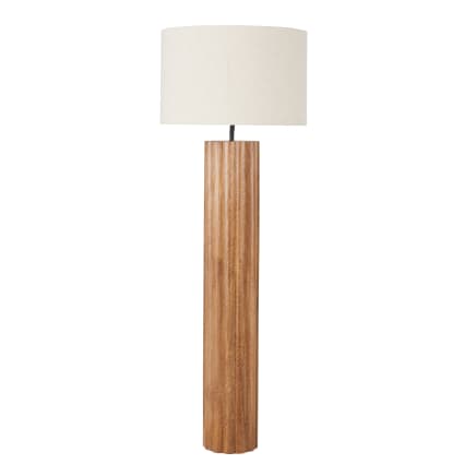 Pied de lampe en bois sculpté représentant un homme