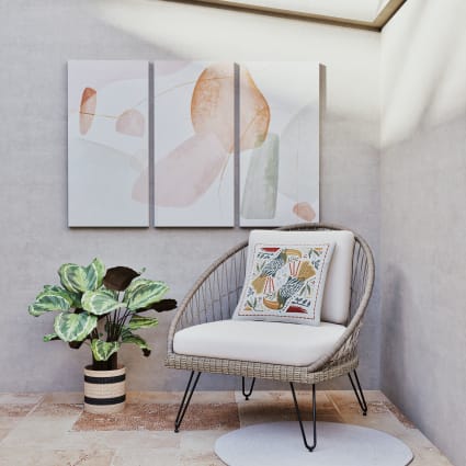 Poltrona da giardino in resina intrecciata e cuscini in tela