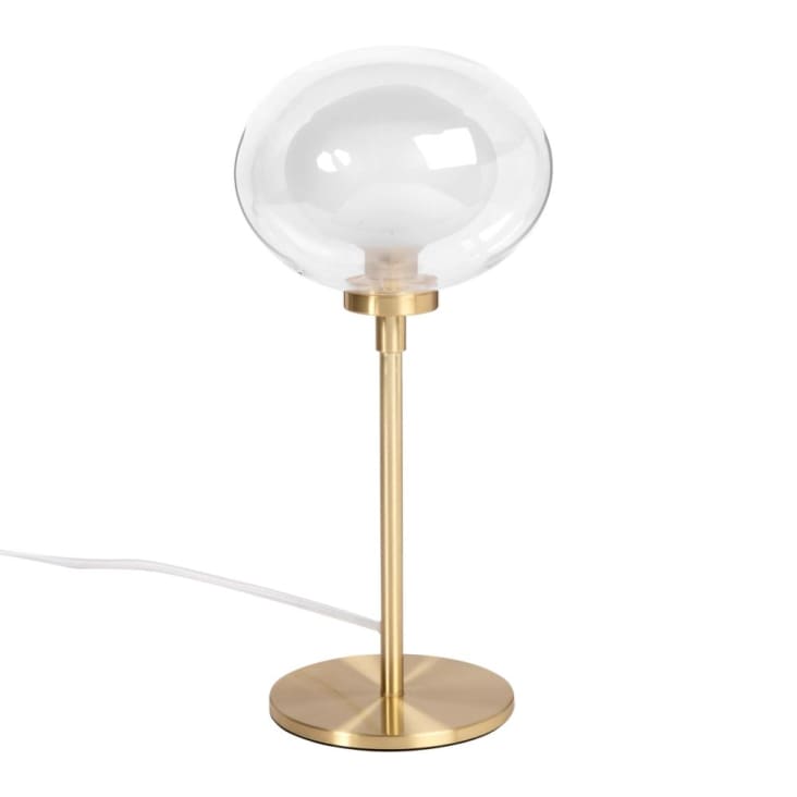 Lampe mit Glaskugelschirm und goldenem Metallsockel