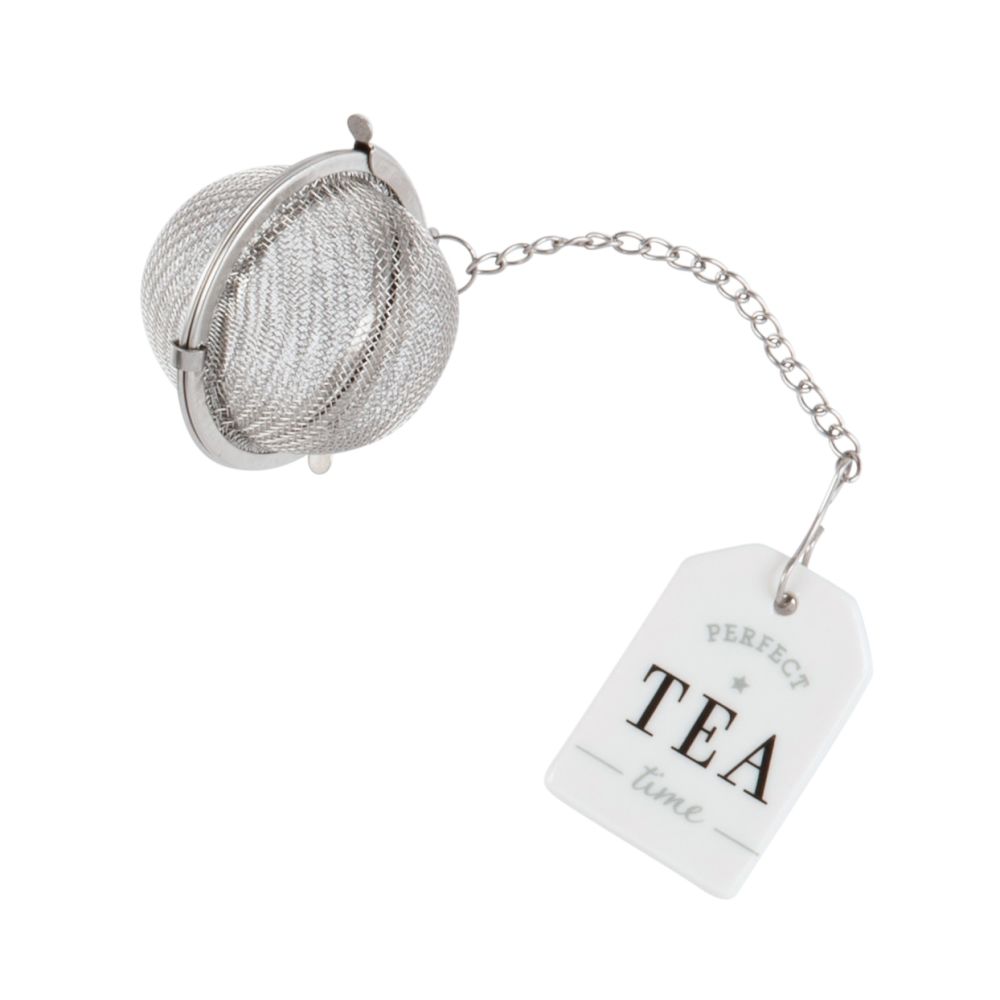 Boule à thé en faïence blanche (photo) Boule à thé en faïence blanche