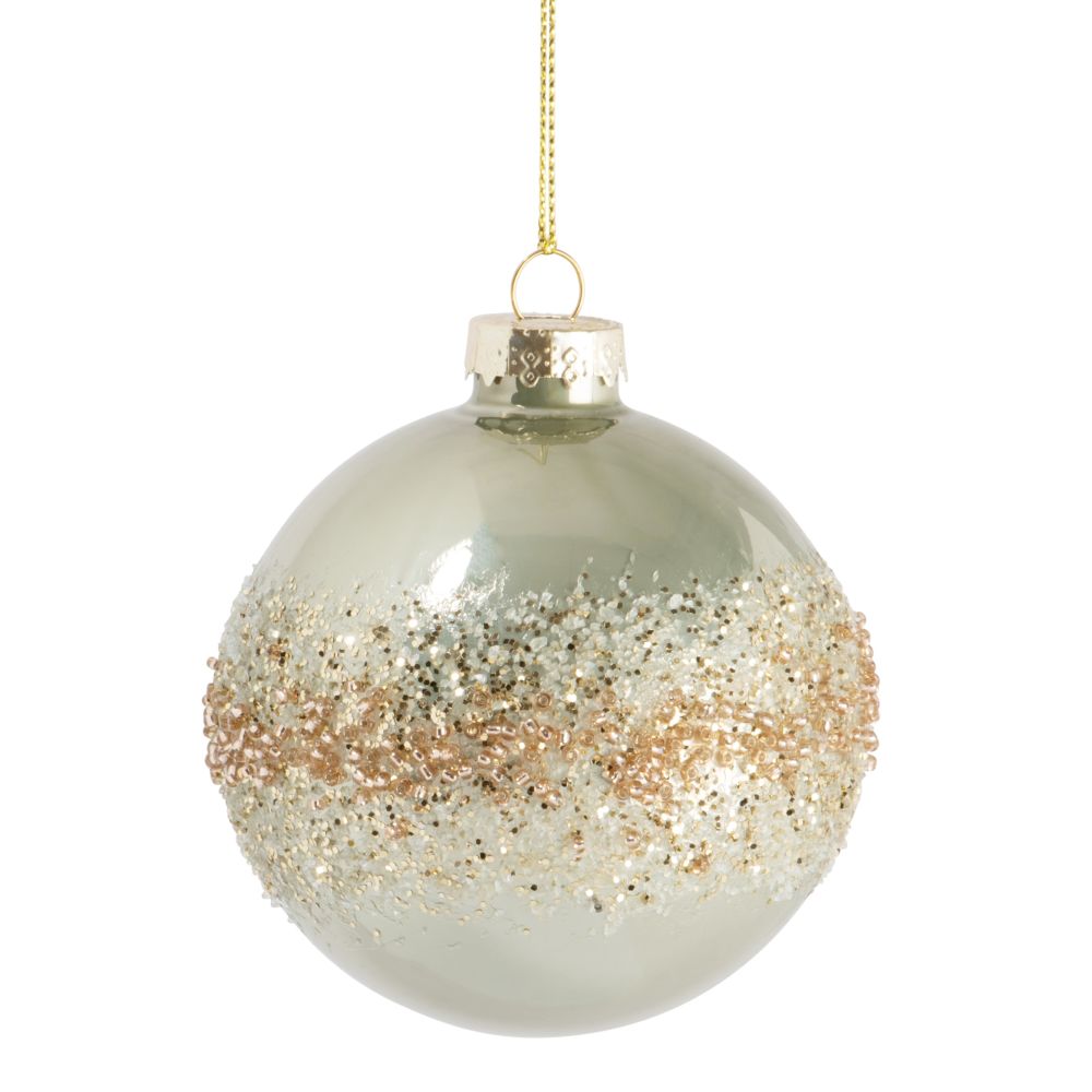 Boule de Noël en verre teinté vert clair, paillettes et perles dorées et blanches Boule de Noël en verre teinté vert clair, paillettes et perles dorées et blanches