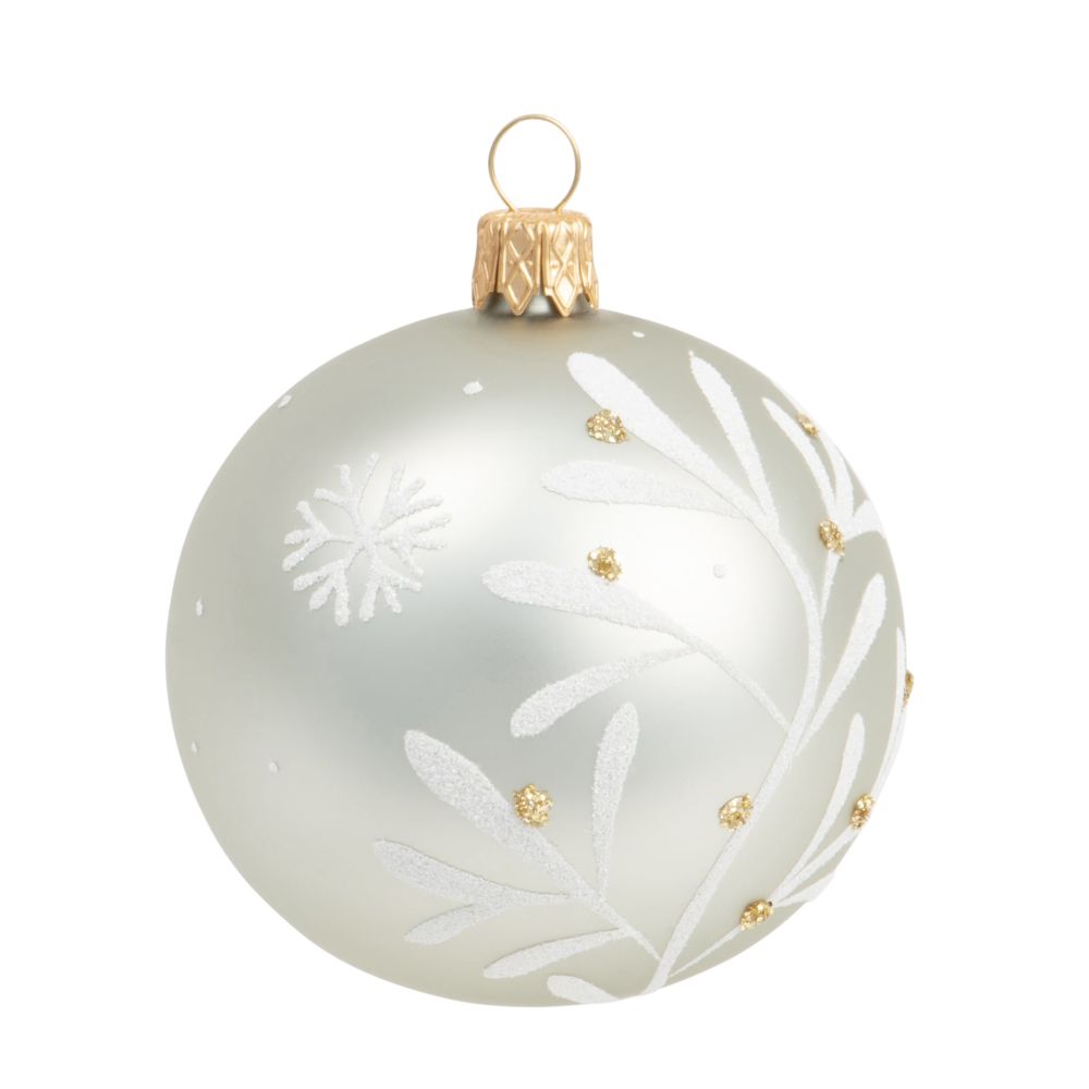 Boule de Noël en verre teinté vert olive motif feuillage blanc et doré Boule de Noël en verre teinté vert olive motif feuillage blanc et doré
