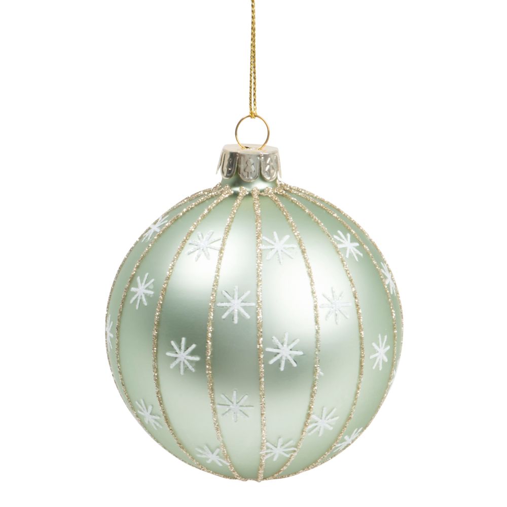 Boule de Noël en verre teinté vert, stries pailletées et motif étoiles blanches Boule de Noël en verre teinté vert, stries pailletées et motif étoiles blanches