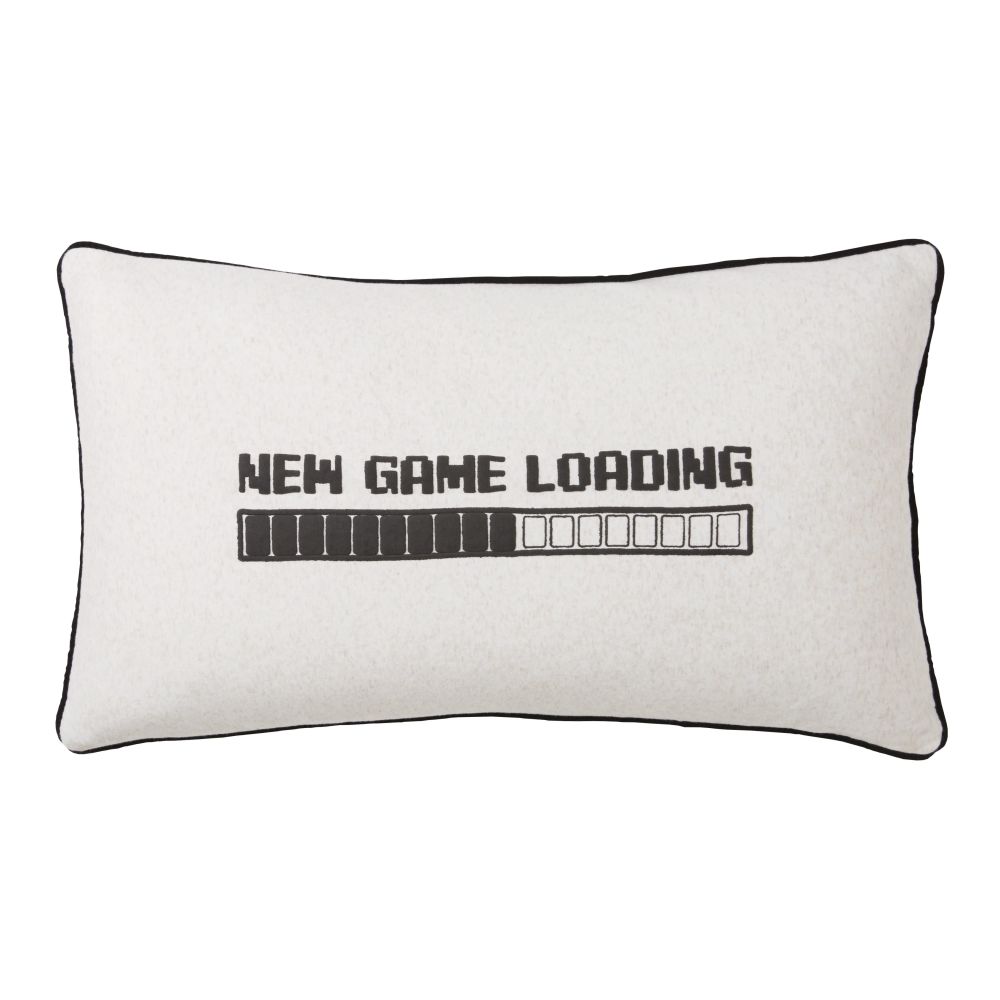 Coussin beige imprimé noir 30x50 (photo) Coussin beige imprimé noir 30x50