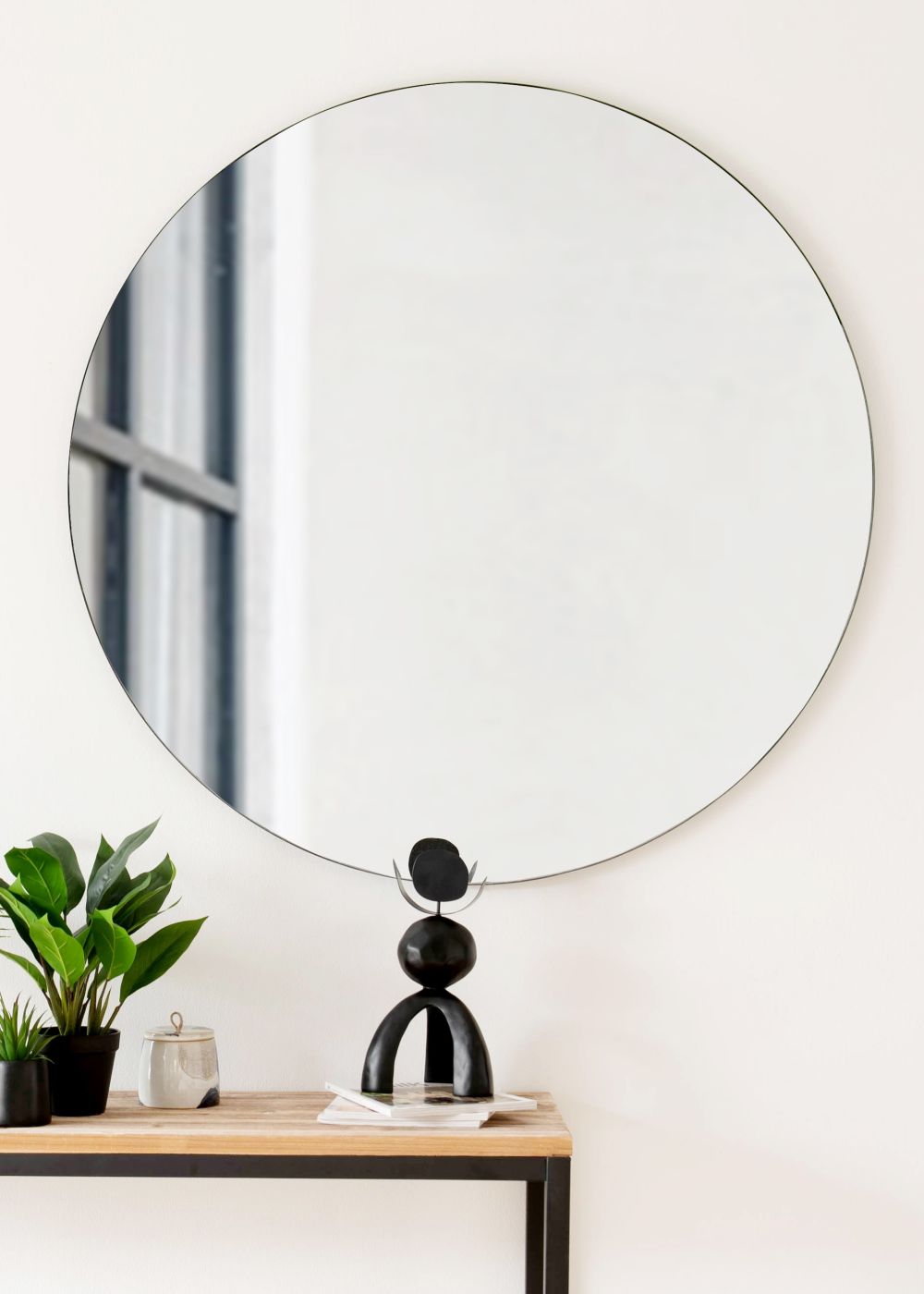 Miroir rond en métal noir D110