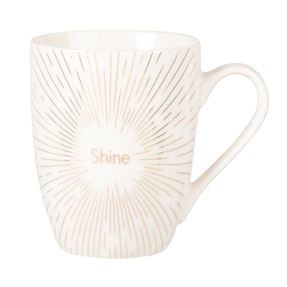 Mug en porcelaine blanche et dorée