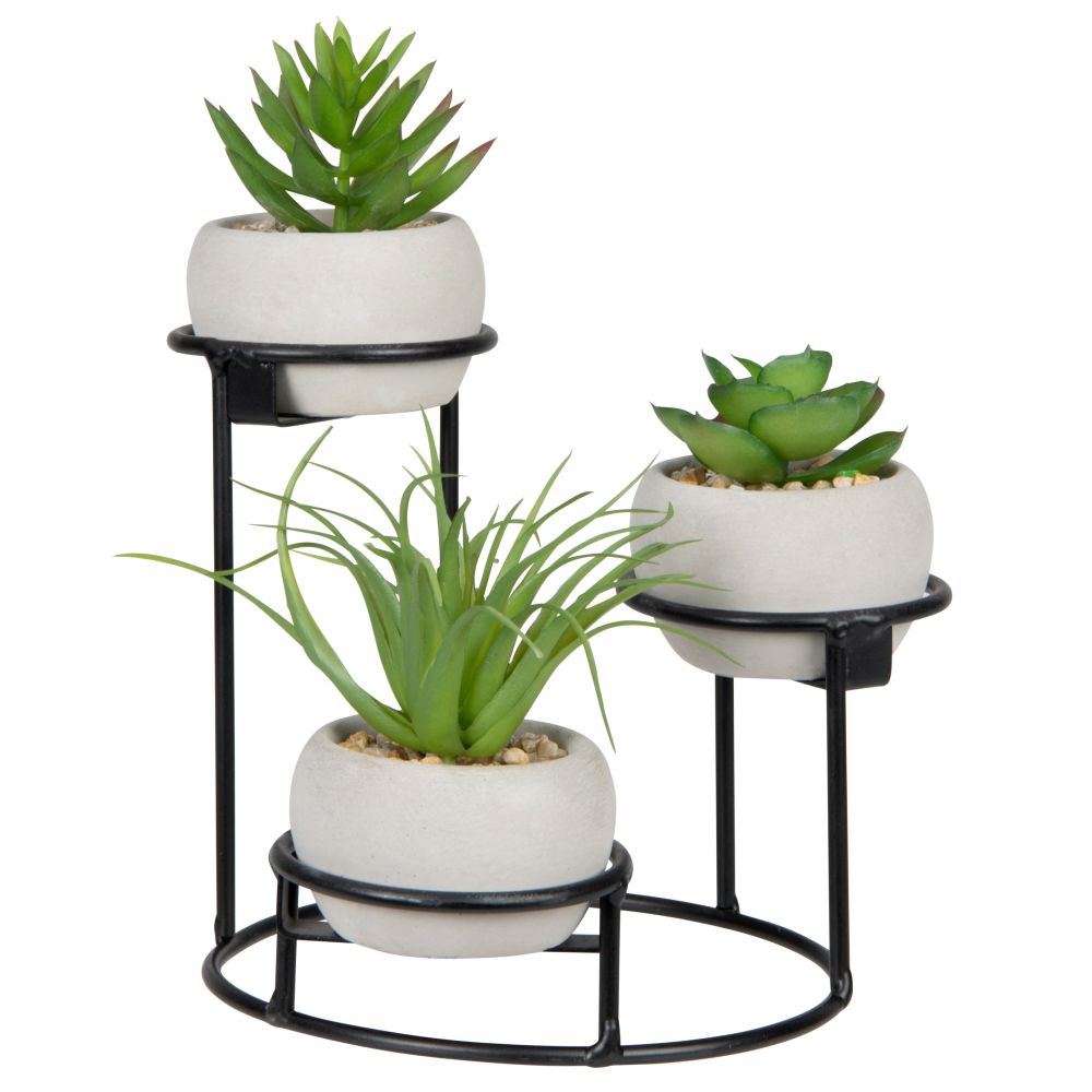 Plantes artificielles et triple pots blancs (photo) Plantes artificielles et triple pots blancs