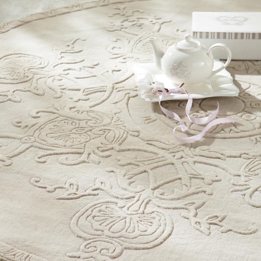 woollen low pile round rug in ecru D 200cm Sculpture Maisons du Monde