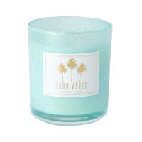 Candela profumata in vetro colorato verde con glitter Candela profumata in vetro colorato verde con glitter