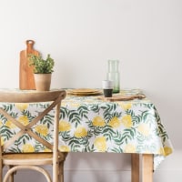 COREOPSIS - Gecoat tafellaken van ecru katoen met geel en groen bloemenmotief 140x250