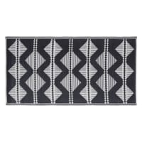 ADEM - Omkeerbaar tapijt van polypropyleen met zwarte, ecru en beige grafisch motieven 75 x 140 cm