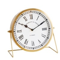 Standuhr aus schwarzem Metall Standuhr aus schwarzem Metall
