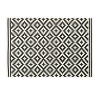 ZARIA - Woven polypropylene rug with black and white graphic print 120x180cm