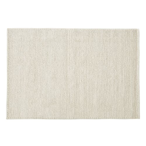 Alfombra de lana tejida beige con relieve 140x200