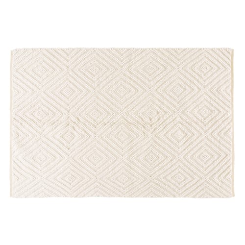 Ecrukleurig tapijt van wol en katoen met grafisch motief 140x200