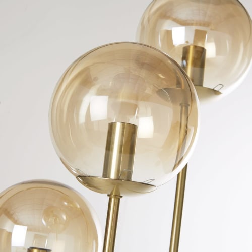President Opeenvolgend Tegenslag Goudkleurige metalen vloerlamp met 3 bollen van amberkleurig glas H114  DREAMLAND | Maisons du Monde