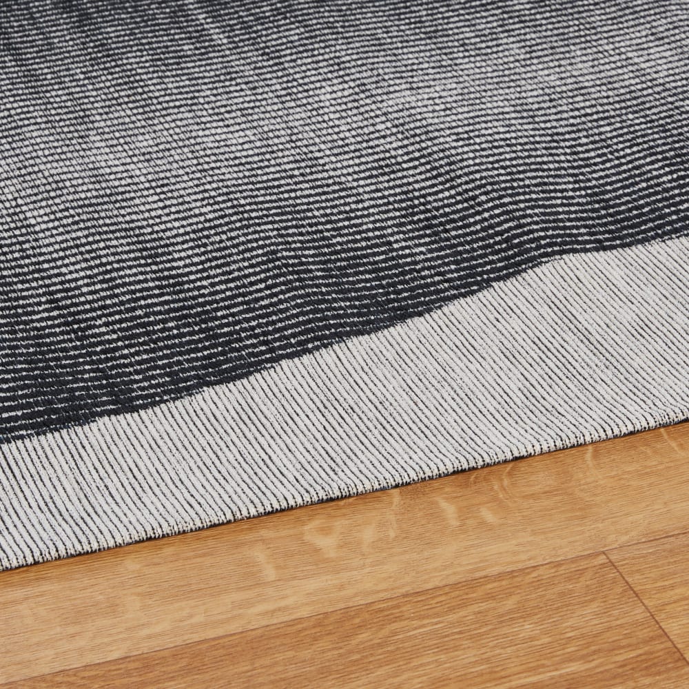 Tapis gris, bleu et écru motif ondulé tissé jacquard 155x230 - Maisons du Monde