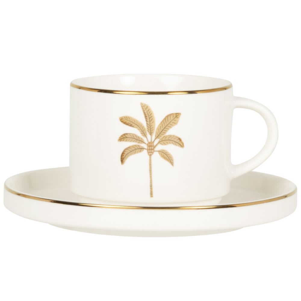 Tasse à thé et soucoupe en porcelaine blanche motif palmier doré et marron