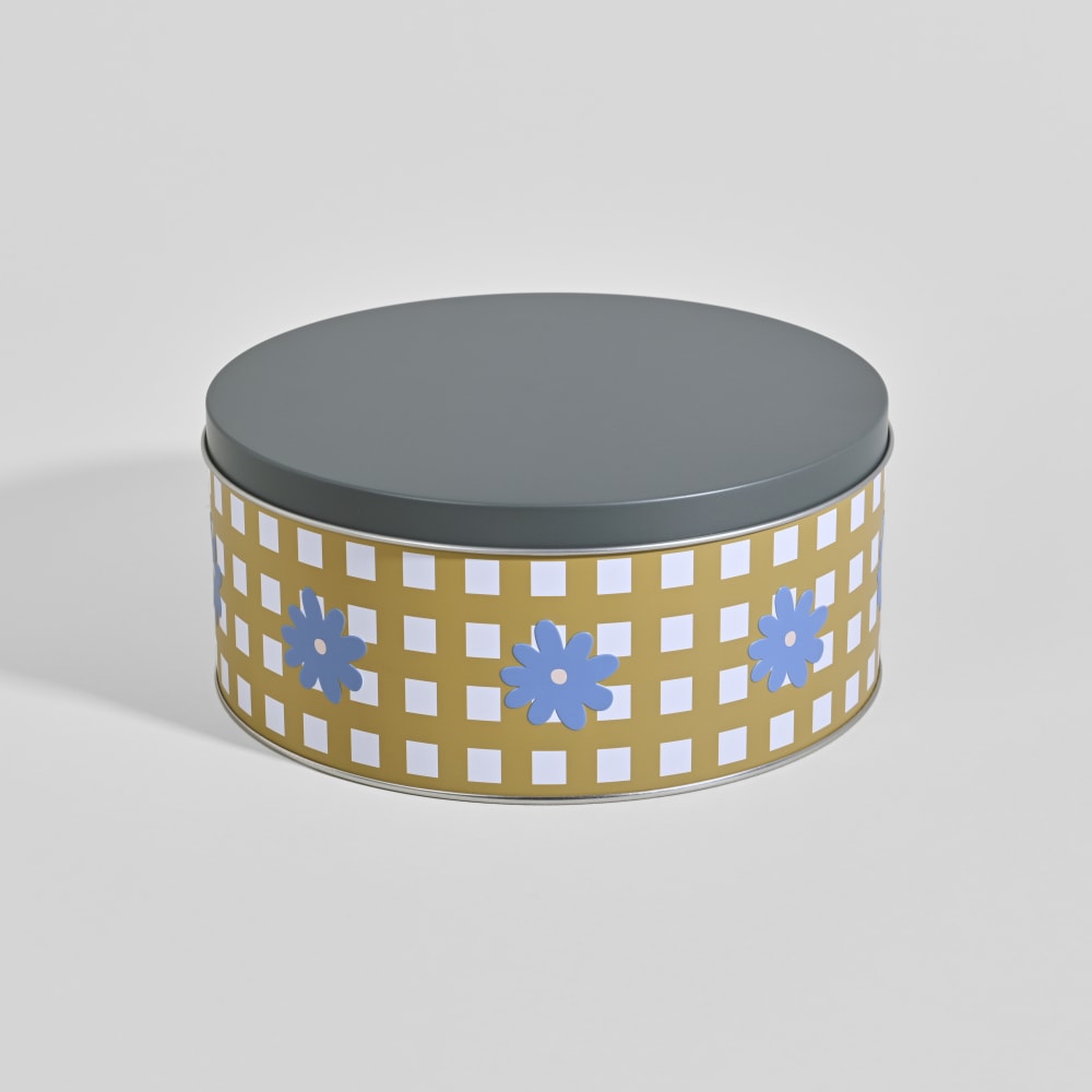 Boîte ronde en métal à motif vichy moutarde et fleurs bleues, couvercle gris