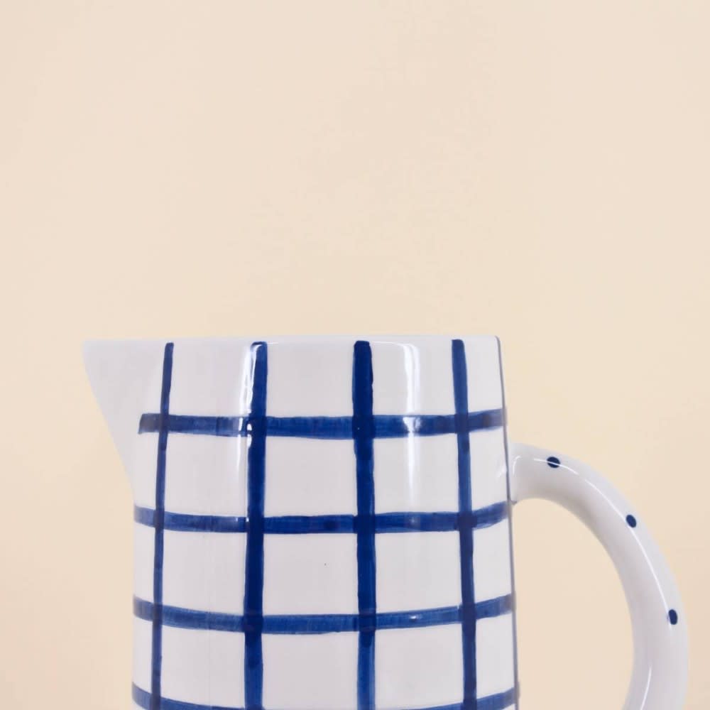 Pichet en émail blanc liseré bleu