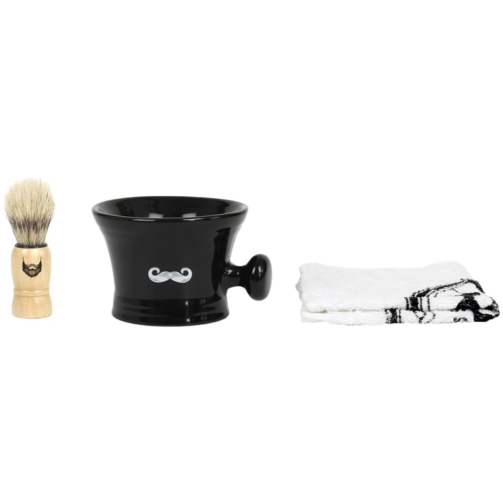 Blaireau en bois, bol noir en grès et serviette blanche