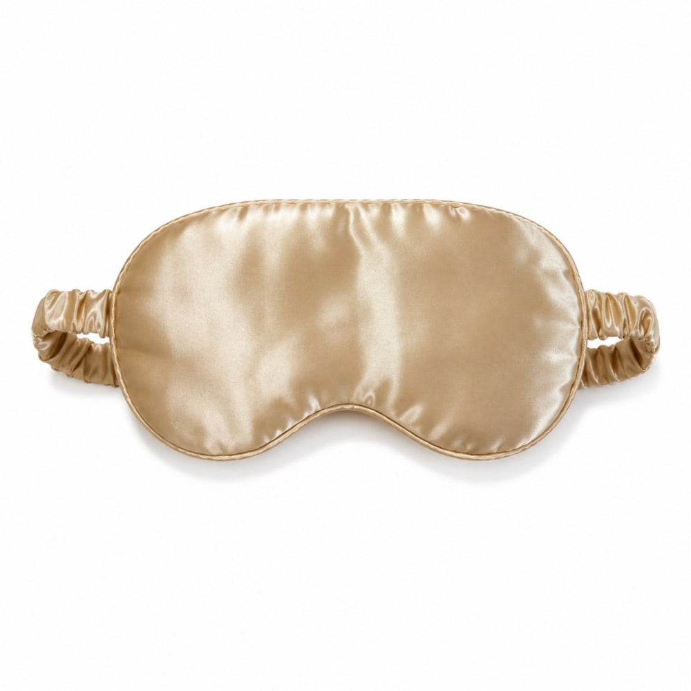 Masque de nuit en satin couleur champagne