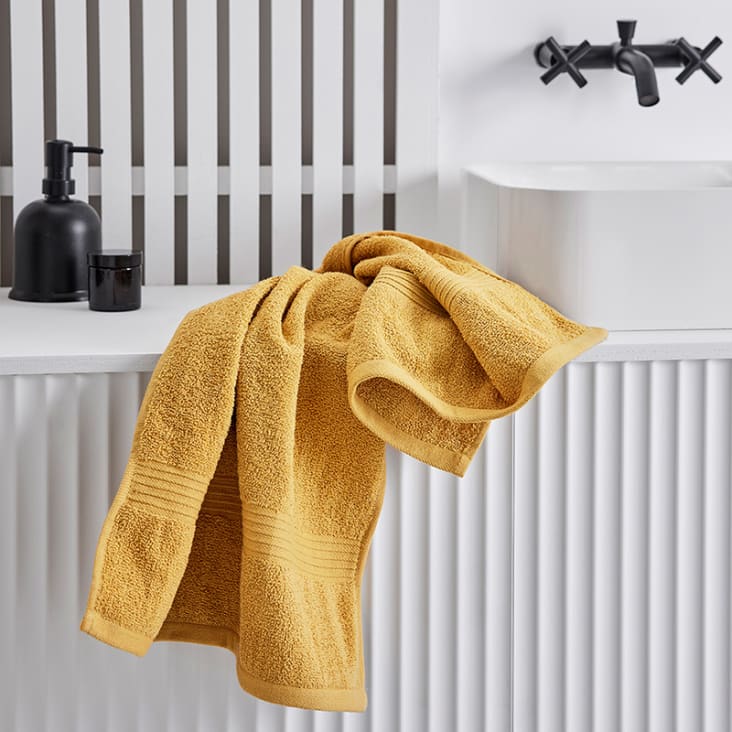 Serviette de bain uni en coton jaune 50x90-Mevak baño