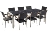 Table acier inox et plateau triple granit avec 8 chaises en rotin