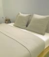 Sábana de punto 100% algodón beige para cama de 135 cm con almohada