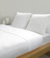 Sábana de punto 100% algodón blanco para cama de 105 cm con almohada
