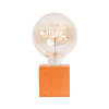 Lampe à poser en béton orange avec son ampoule à message