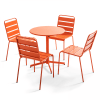 Mesa redonda de jardín y 4 sillas naranjas