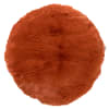 Coussin rond orange fausse fourrure 45 cm uni