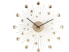 Horloge ronde en métal sunburst 50 cm doré