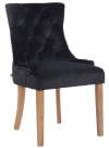 Silla con patas de madera y asiento en terciopelo negro