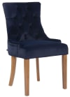 Silla con patas de madera y asiento en terciopelo azul