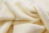 Couverture en coton recyclé beige 180 x 220 cm