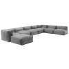 Sofá de esquina modular con 5 sillones, 2 ángulos y 1 puff gris.
