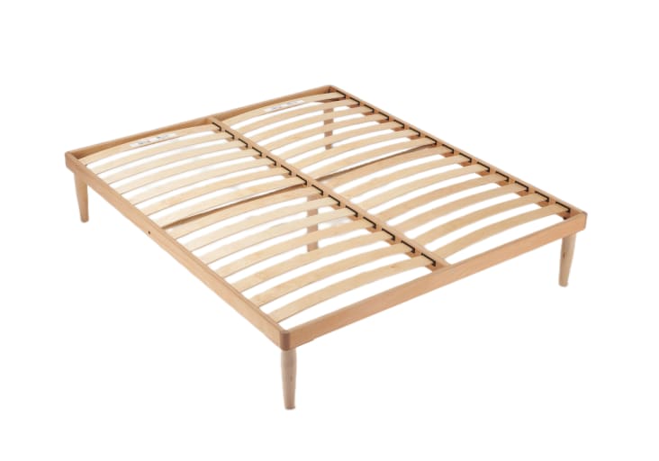 Letto matrimoniale con testata e rete a molle