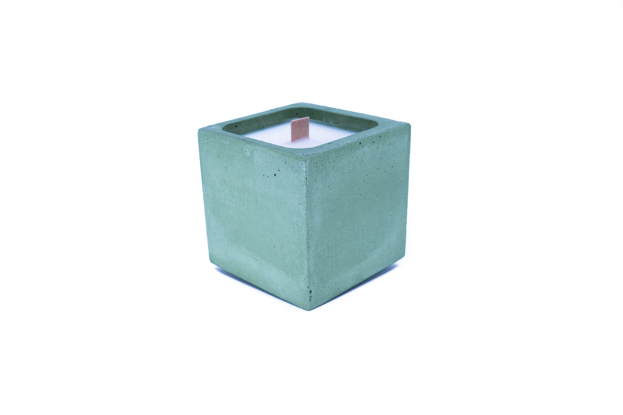 Bougie en béton coloré vert fleur de coton Bougie en béton coloré vert fleur de coton