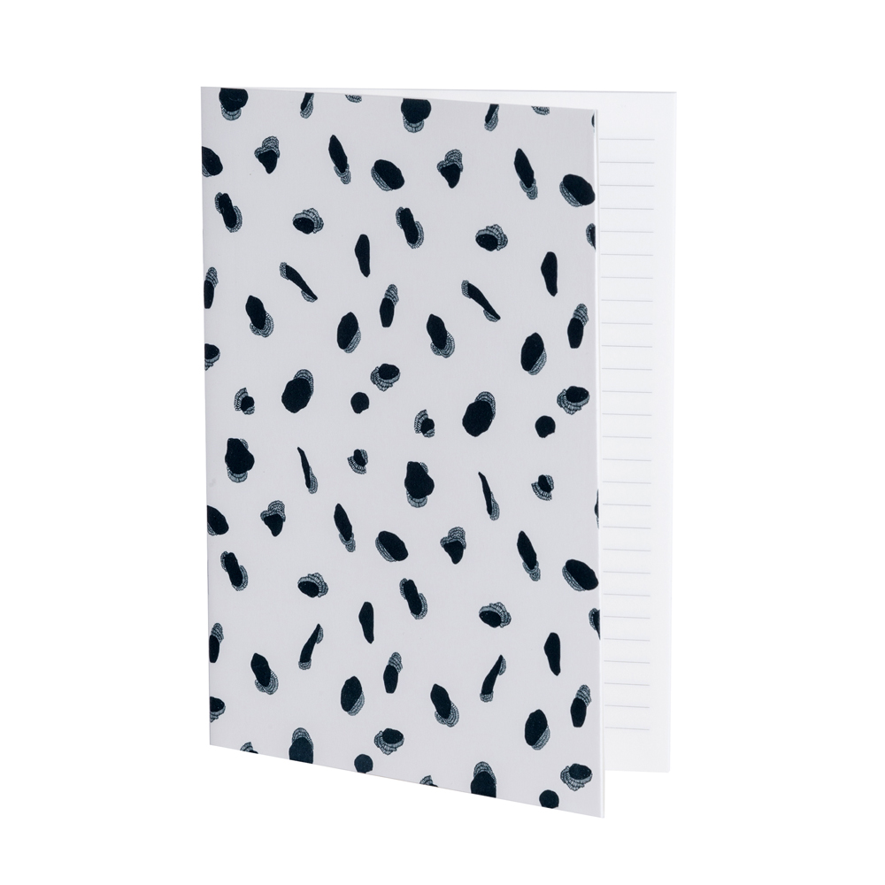 Cahier ligné imprimé moucheté noir et blanc Cahier ligné imprimé moucheté noir et blanc