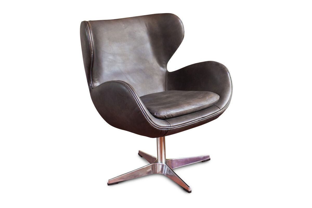 Fauteuil vintage en cuir marron Fauteuil vintage en cuir marron
