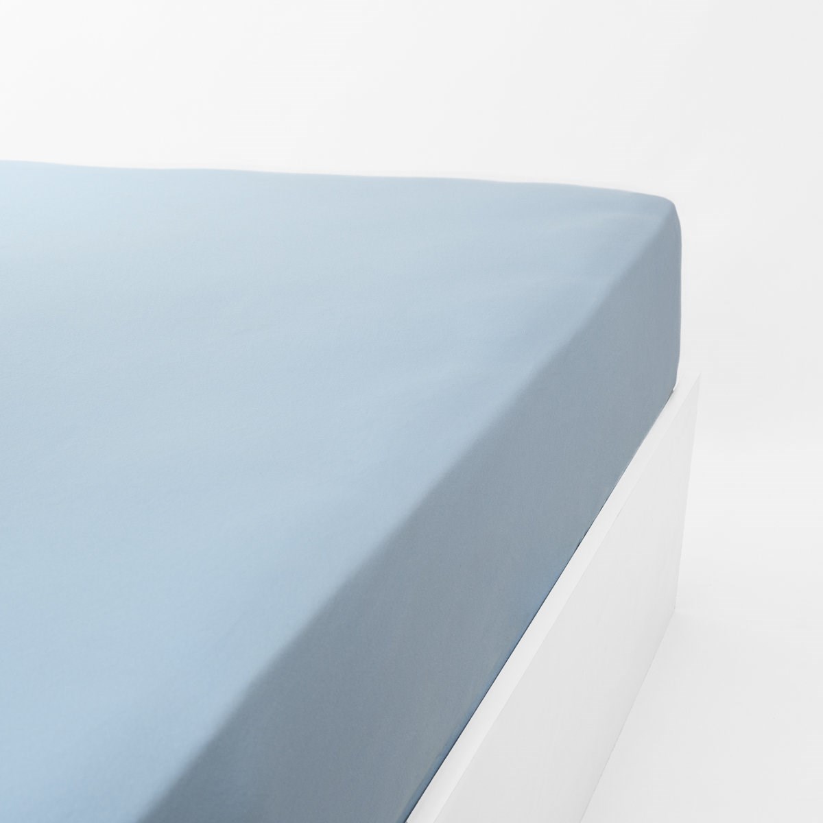 Drap housse jersey extensible en coton bleu clair 90x200 cm Drap housse jersey extensible en coton bleu clair 90x200 cm