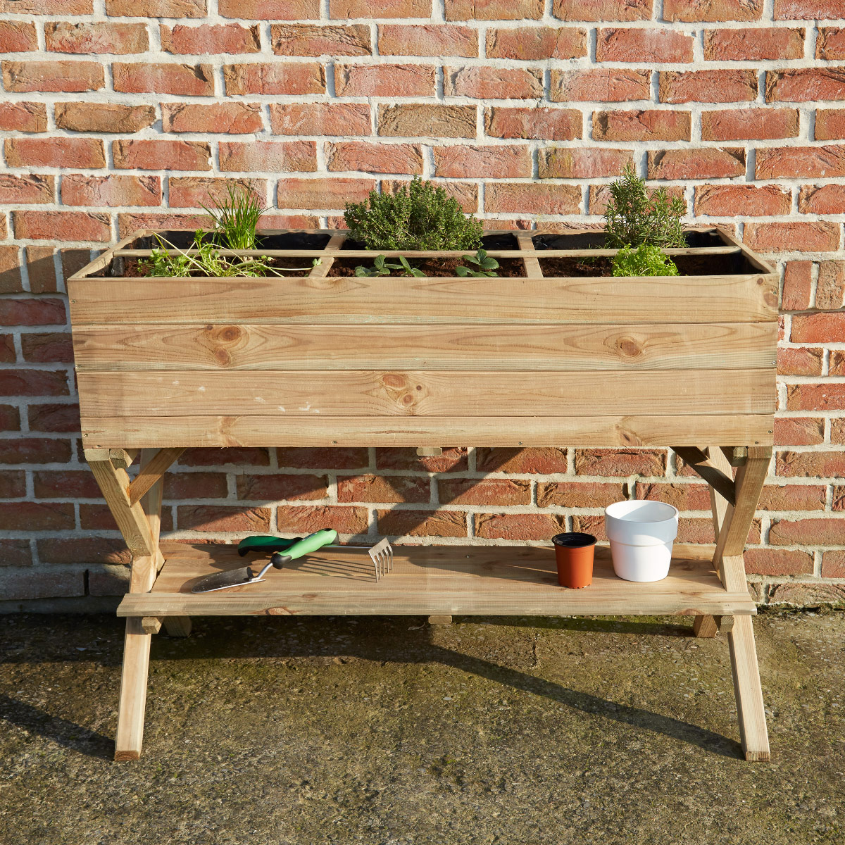 Potager sur pieds croisés en pin traité