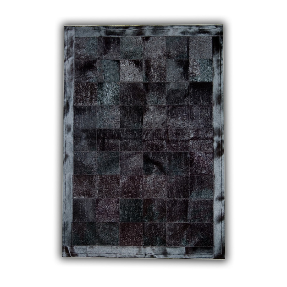 Tapis ethnique patchwork en peau de vache noir 120x180