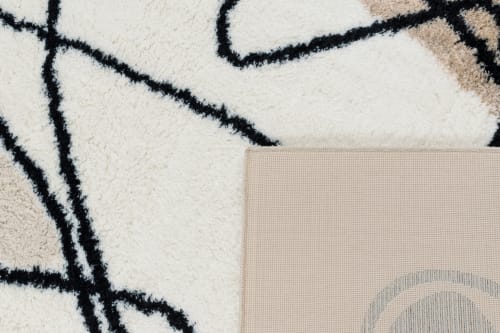 Tappeto da salotto astratto beige, nero e avorio - 120x160 cm